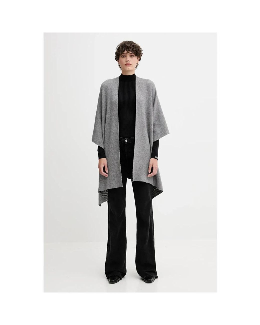 Capes Benetton en coloris Gray