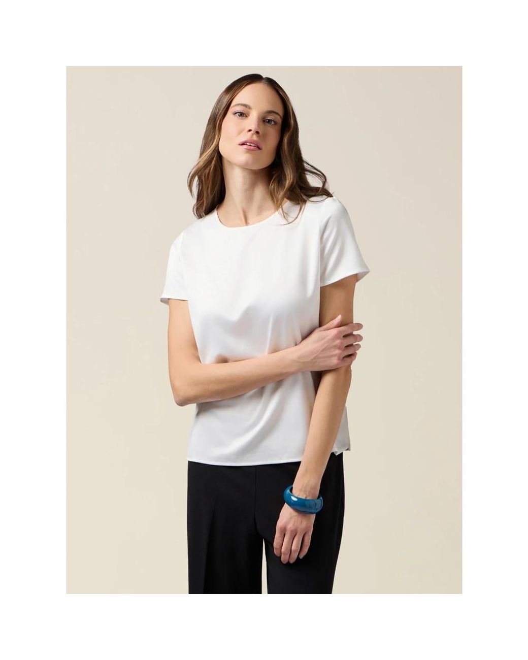 T-Shirts Oltre de color White