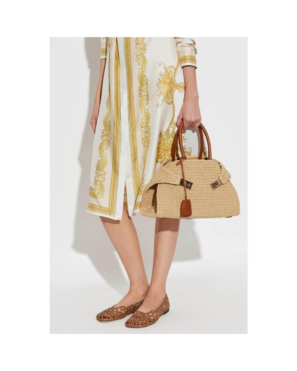 Handbags di Ferragamo in Brown
