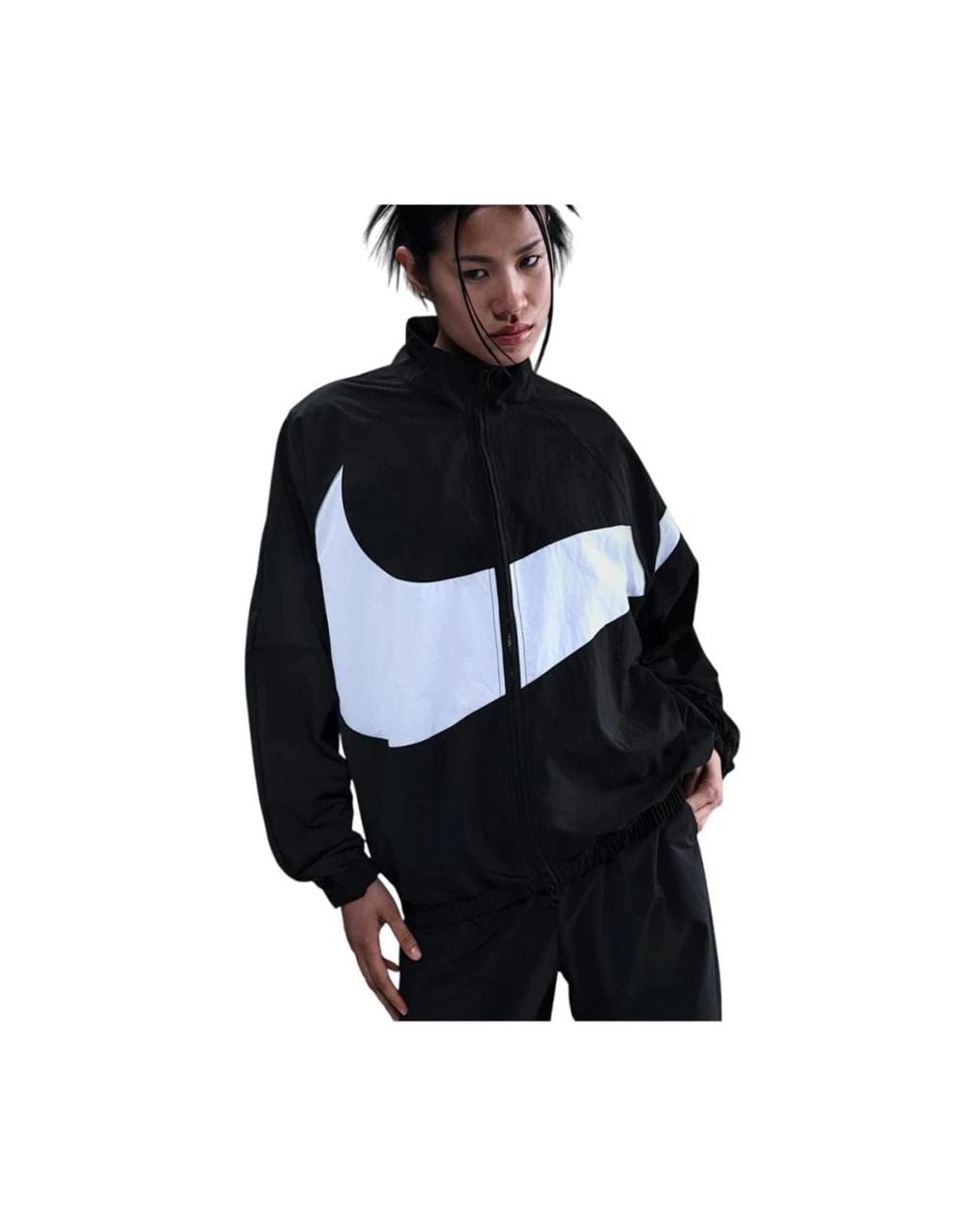 Wind Jackets Nike en coloris Black