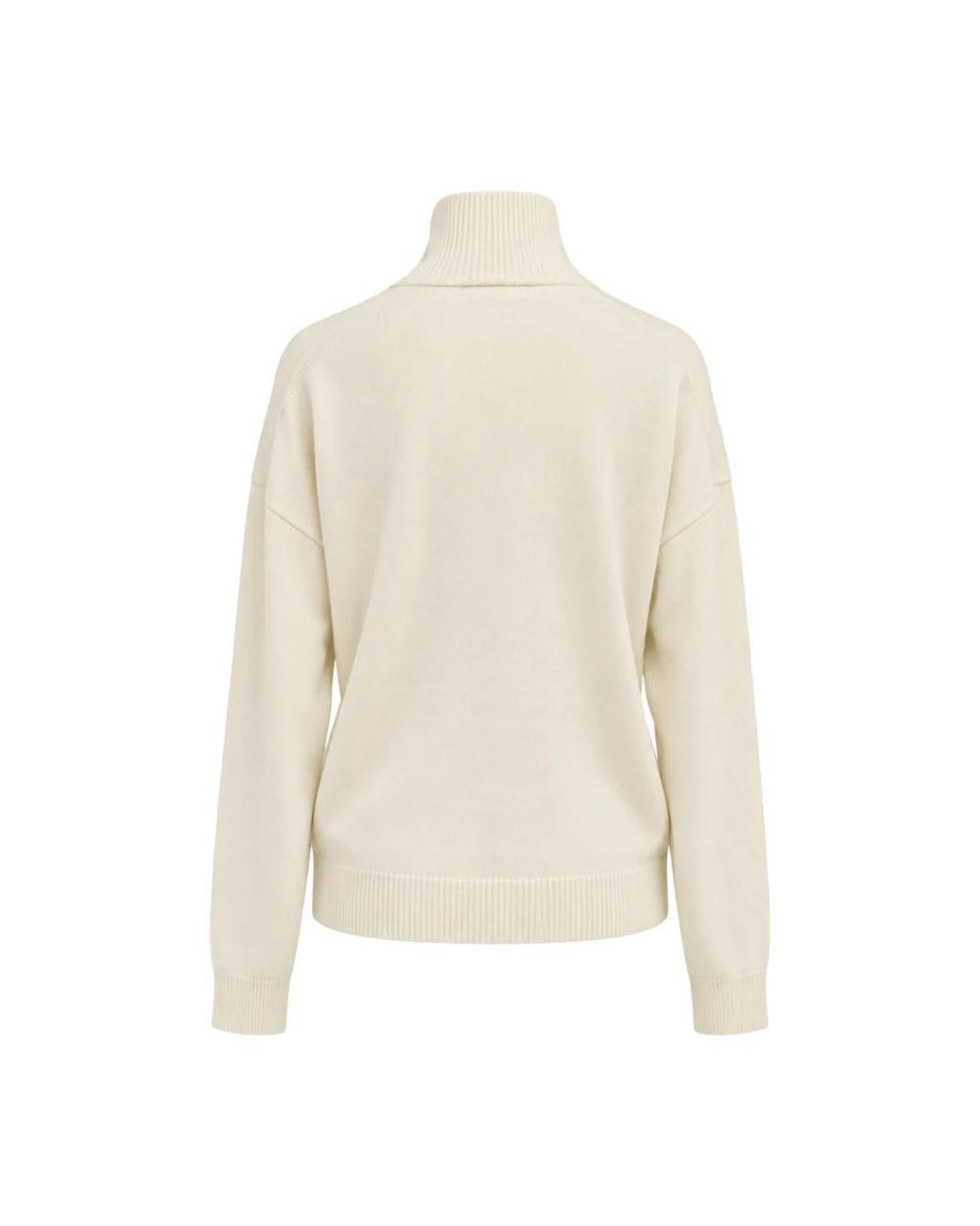 Seventy Natural Turtlenecks