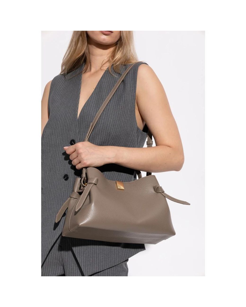 Handbags di Yuzefi in Brown