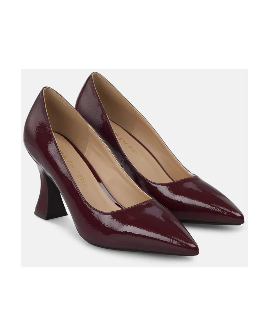 Alma En Pena. Purple Pumps