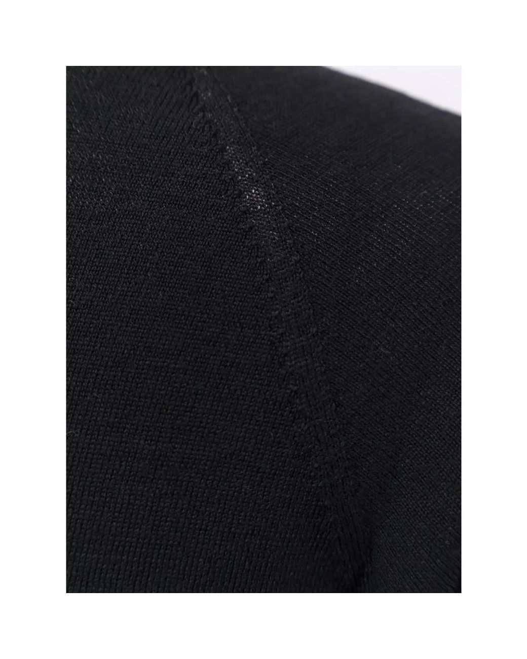 The Row Black Turtlenecks
