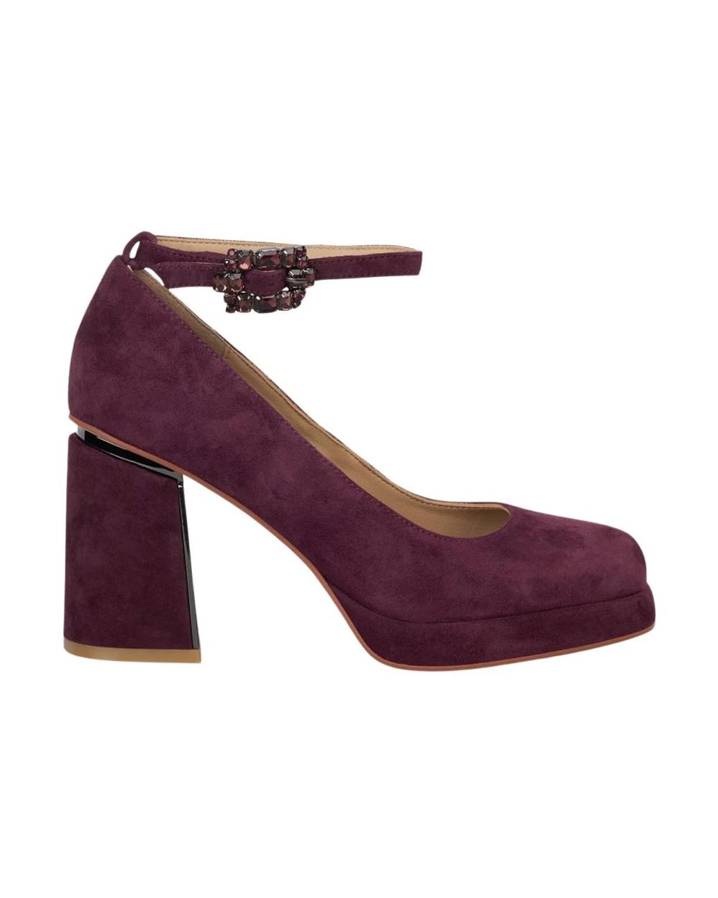 Alma En Pena. Purple Pumps