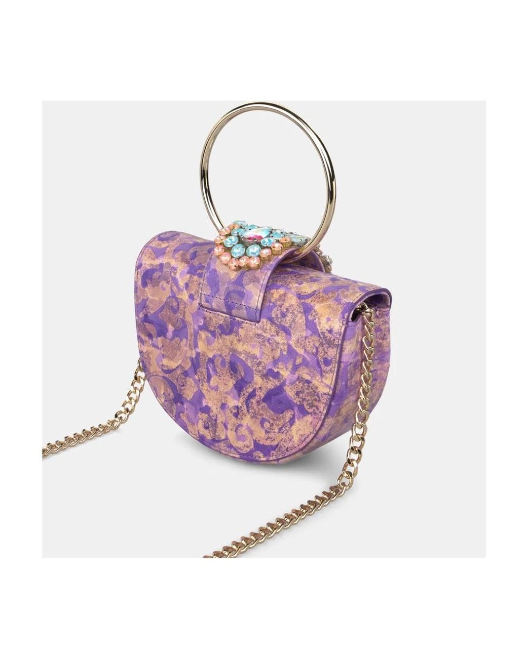 Alma En Pena. Purple Handbags