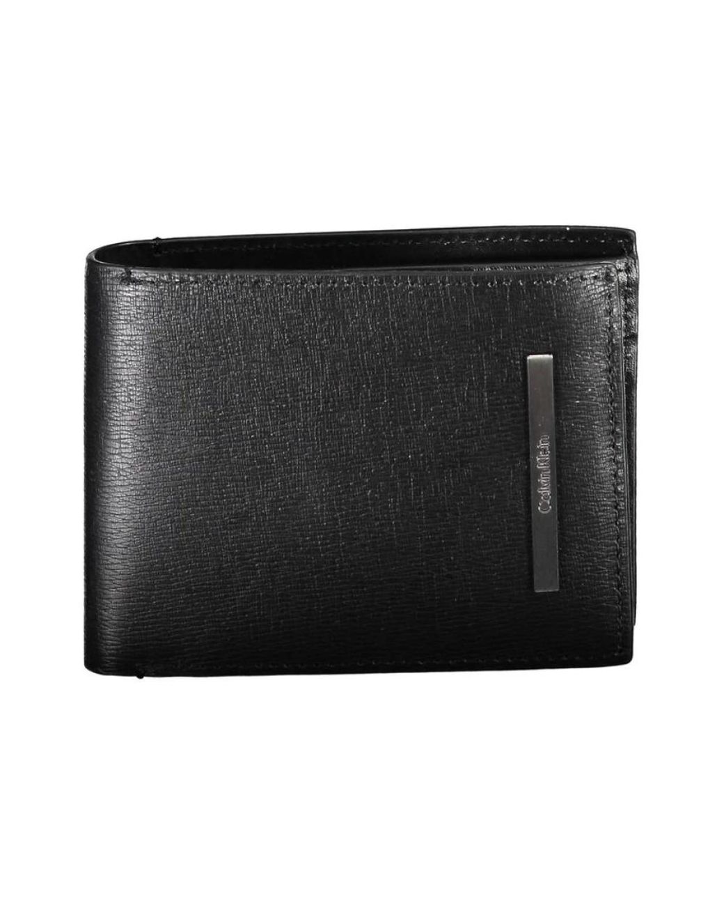 Calvin Klein Accessoires ,Zwart ,Stijlvolle Rfid-Beveiligde Bi-Fold Portemonnee in het Black voor heren