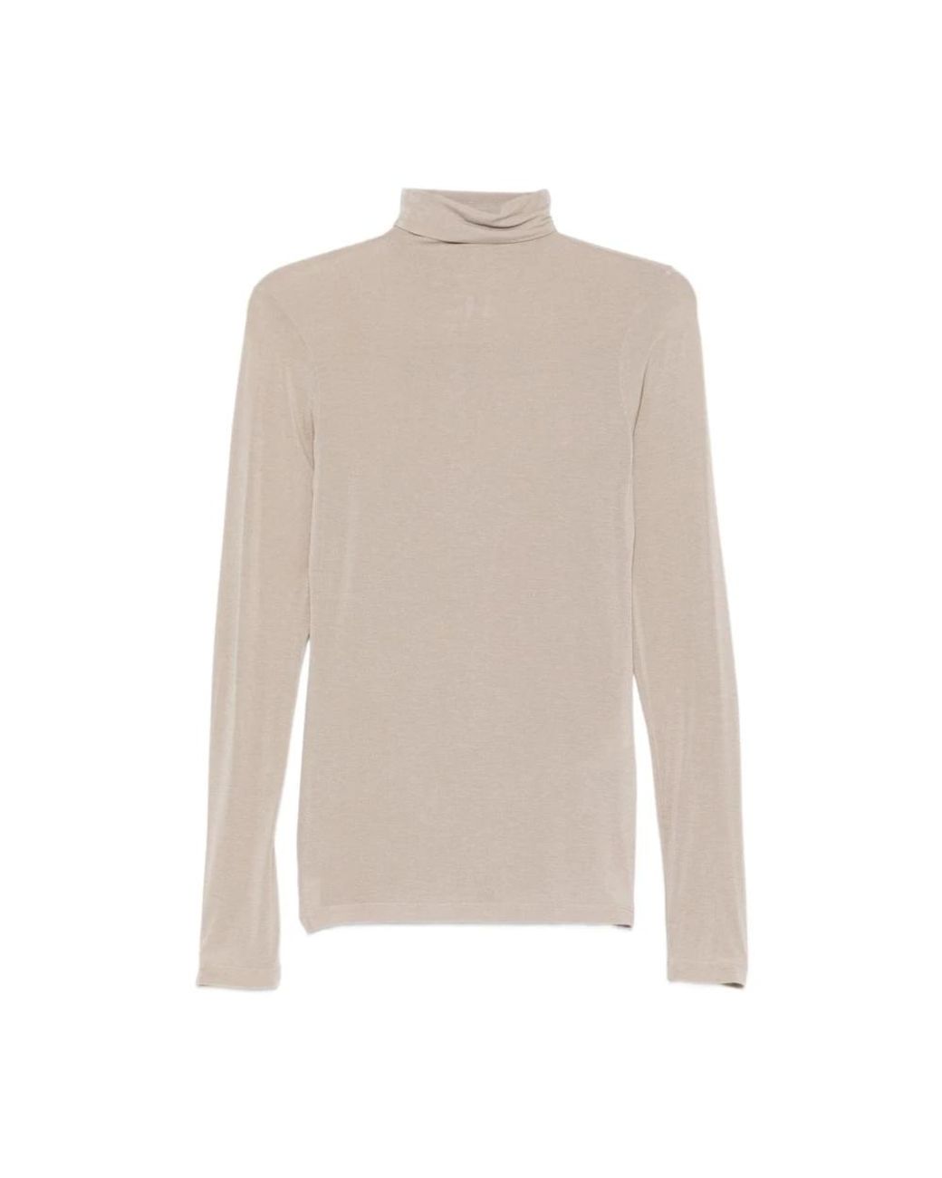 Seventy White Turtlenecks