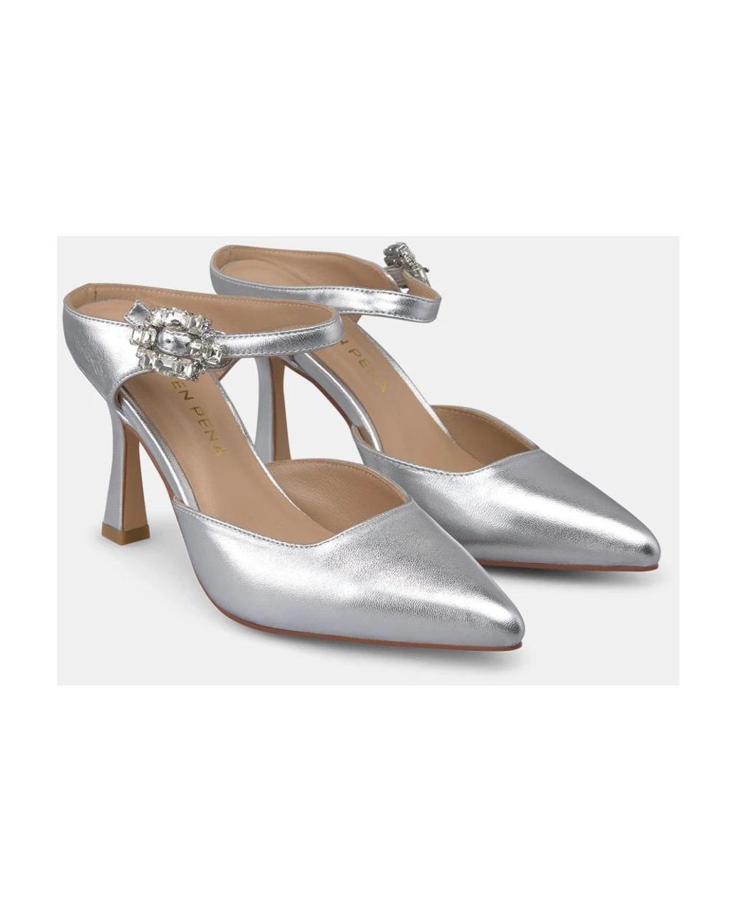 Alma En Pena. Metallic Heeled Mules