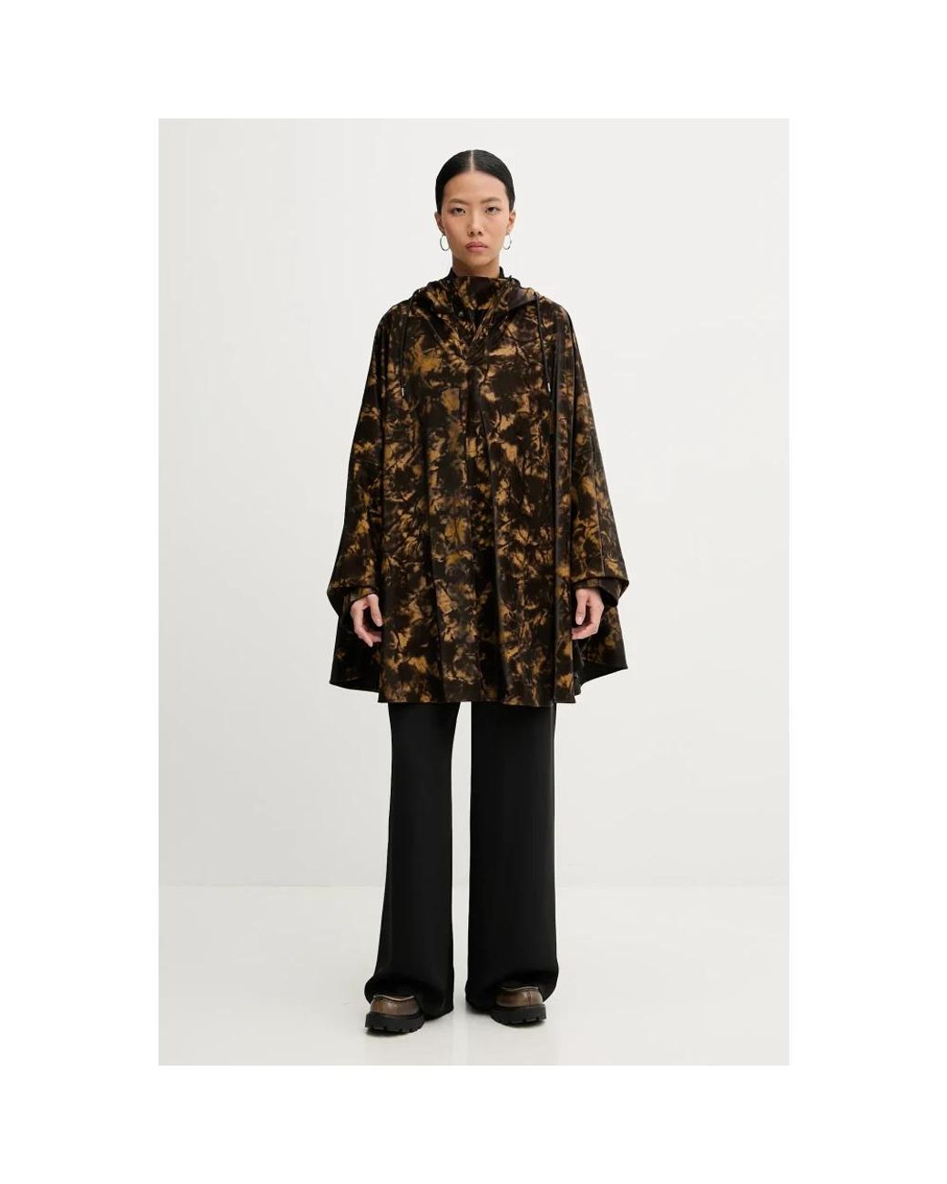 Capes di Rains in Brown