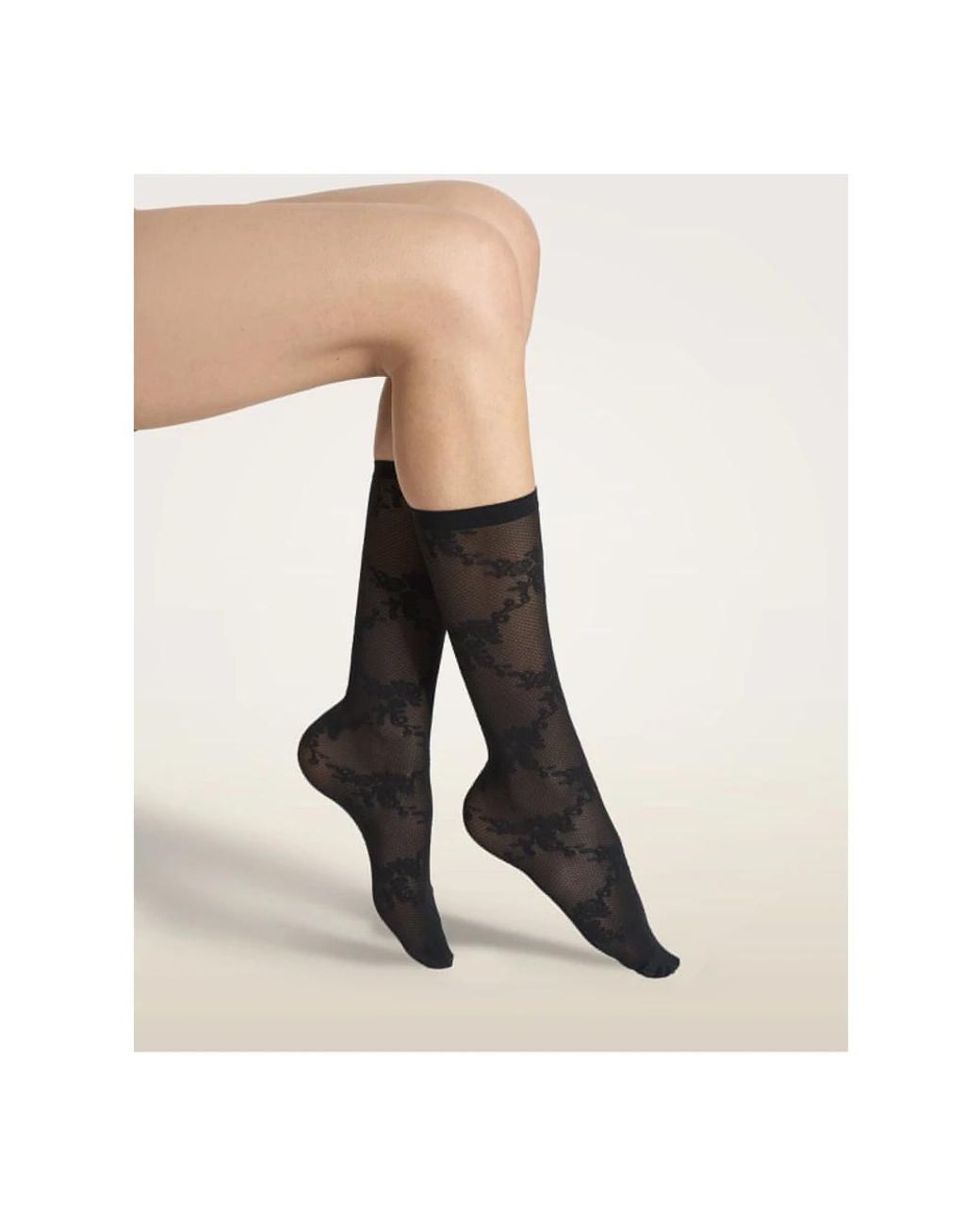 Socks Wolford en coloris Black