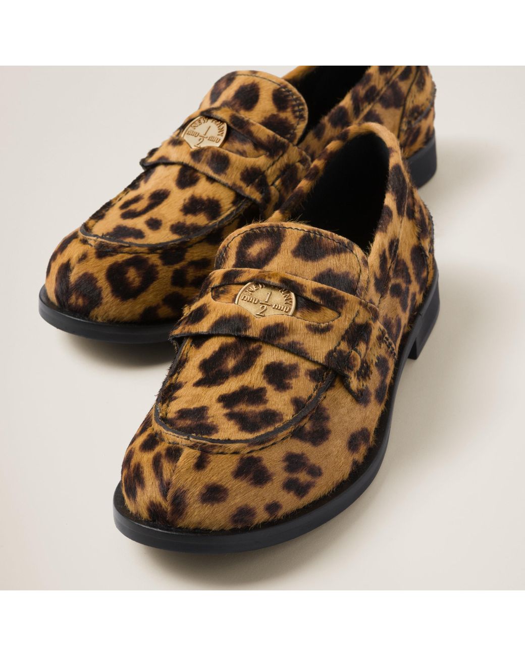 Miu Miu Leopard print Calf Hair effect Loafers in Brown Lyst
