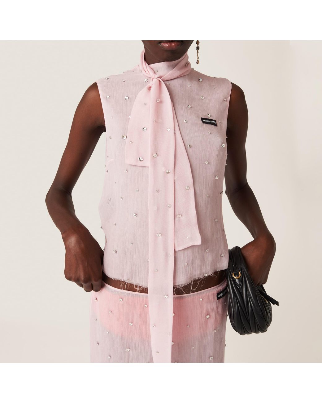 miu miu ストーン装飾 ピンク タンクトップ miu miu ストーン装飾 ピンク タンクトップ - メルカリ
