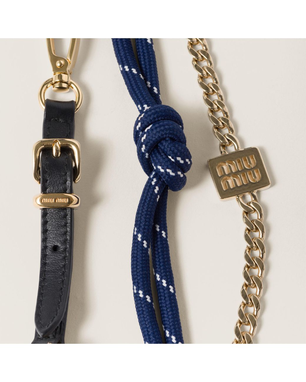 アクセサリーその他 MIU MIU 5TL515_2CRT LEATHER CORD+L TRICK WITH MINI POUCH Miu Miu Leather, Cord, And Metal Trick With Mini-Pouch in