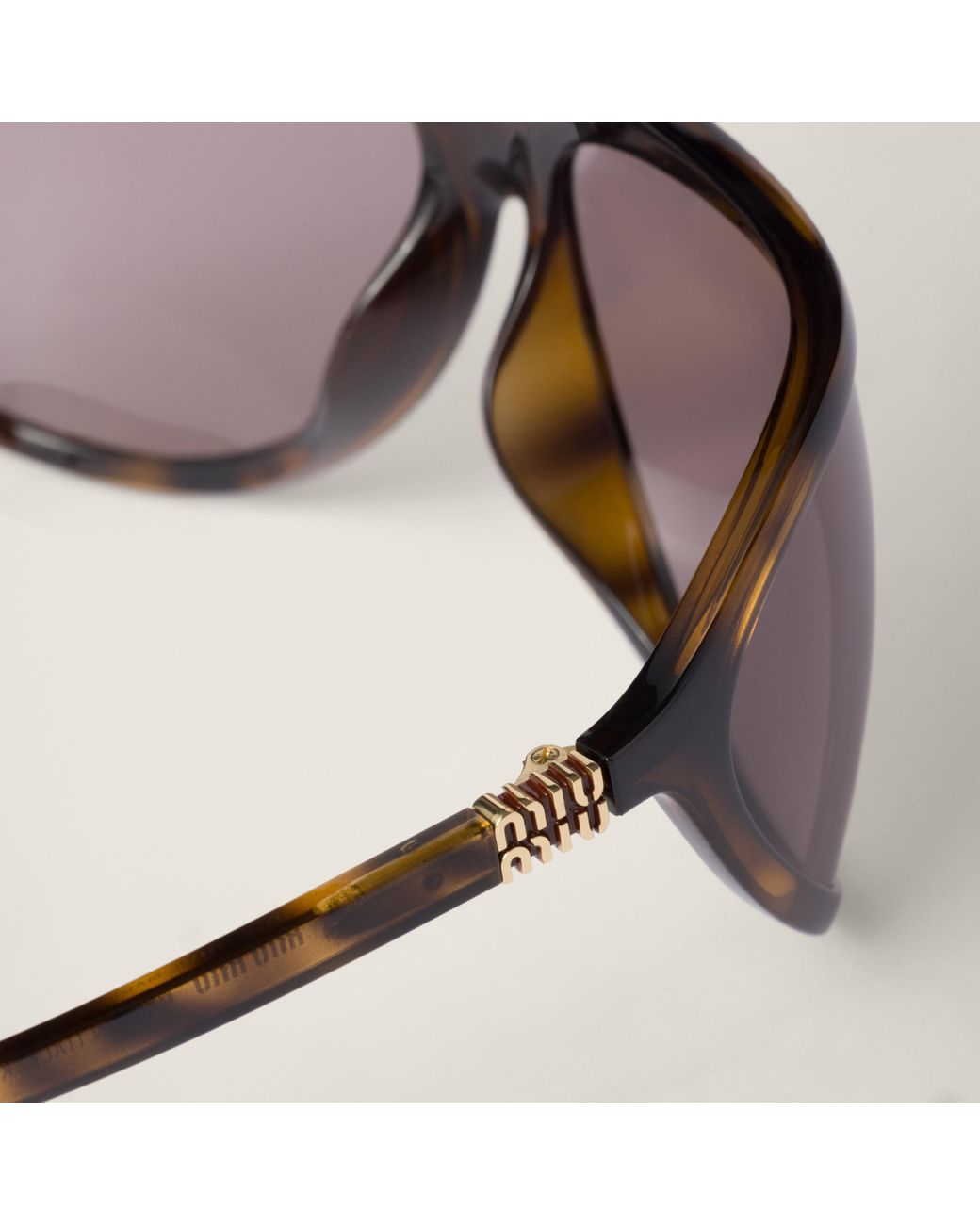 Miu Miu Miu Enigme Sunglasses | Lyst