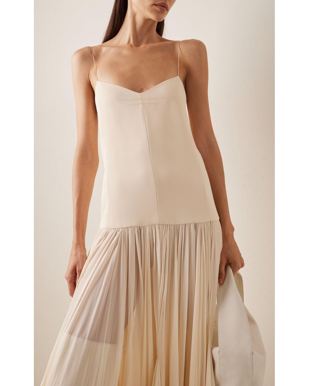 KHAITE Zeke Plisse-trimmed Woven Maxi Dress in White | Lyst KHAITE Zeke Plisse-trimmed Woven Maxi Dress in White | Lyst