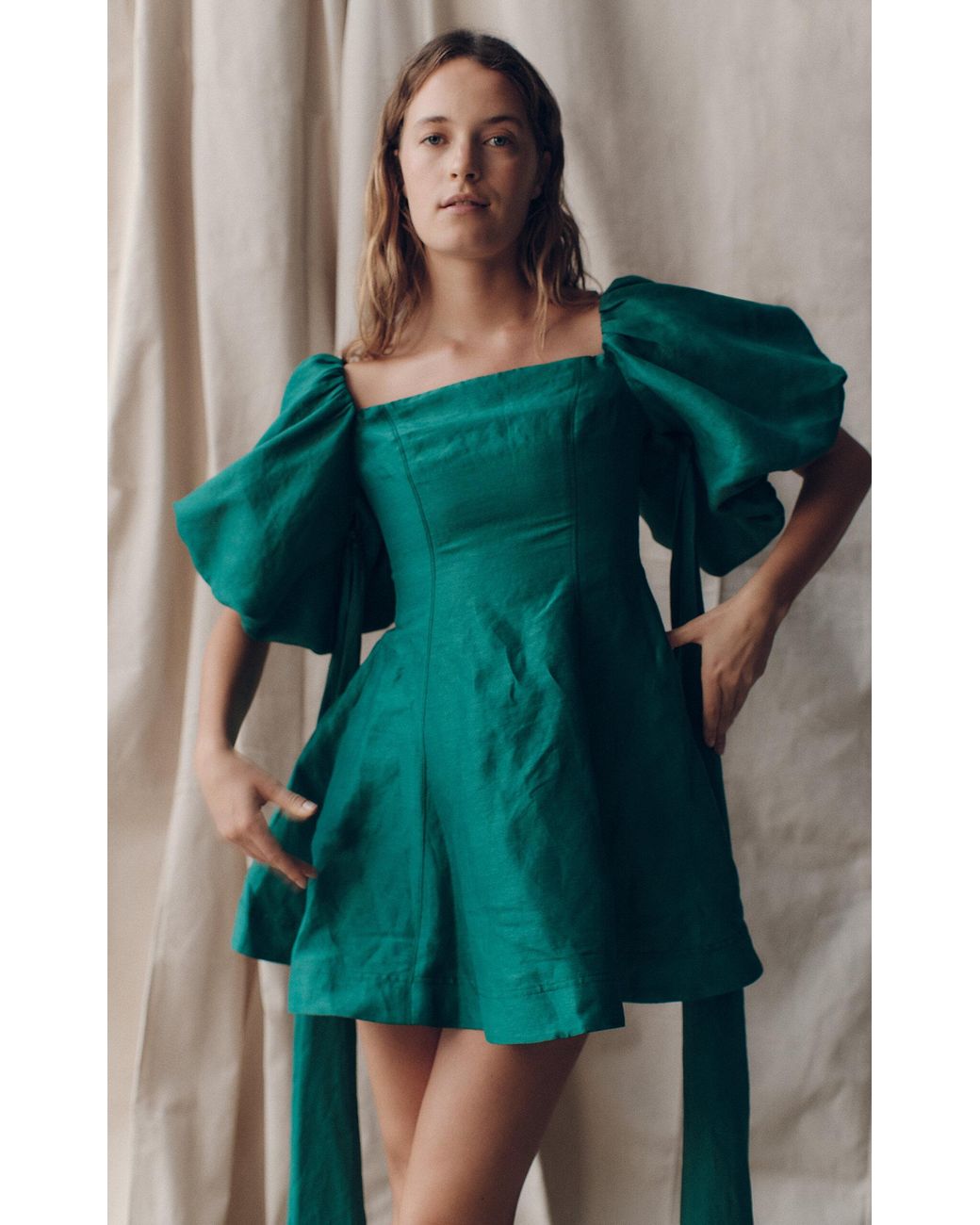 green emerald velvet dress Dusk knot puff sleeve mini dress emerald green main image 0