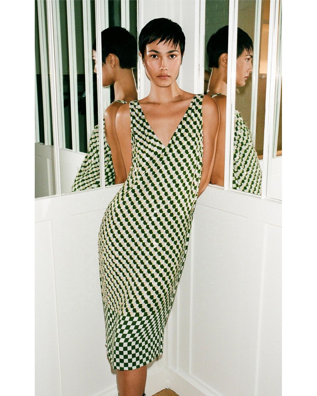 dries van noten green dress DRIES VAN NOTEN Gathered two-tone stretch-jersey halterneck midi dress