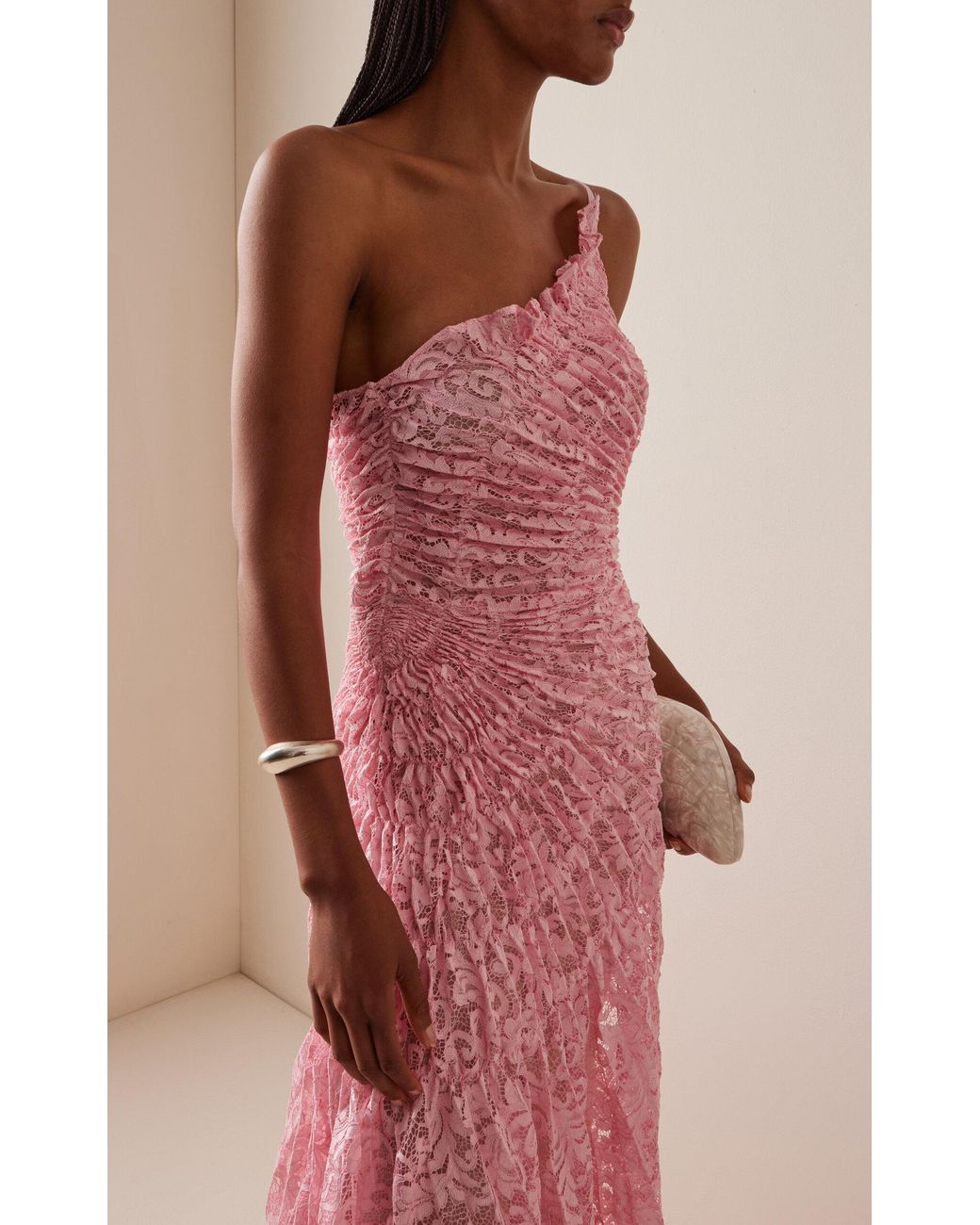 georgia hardinge utopia lace maxi dress THE UTOPIA DRESS PINK BESTSELLER The Utopia floor length dress showcases a captivating fossil-inspired design with elastic stitches that contour the body, offering flexibility for comfort while cinching