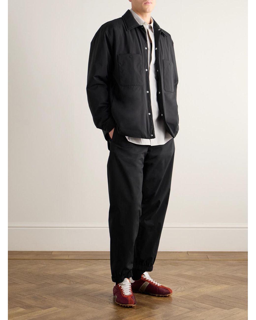 Laminar Black Tapered Shell Trousers for men