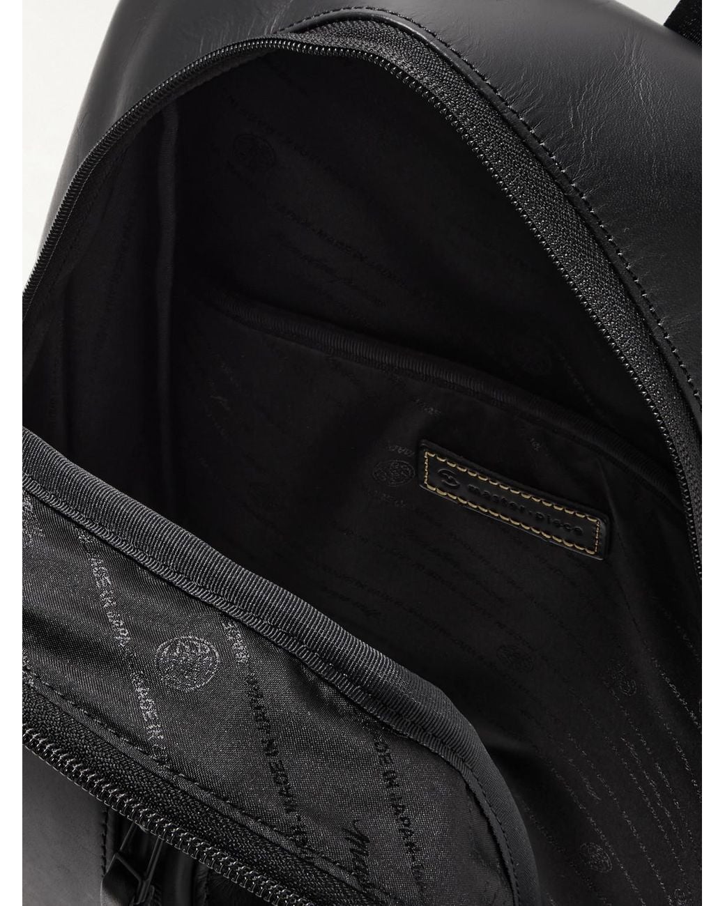 Master Piece Black Slick Logo-Appliquéd Leather And Cordura Ballistic Nylon Backpack for men
