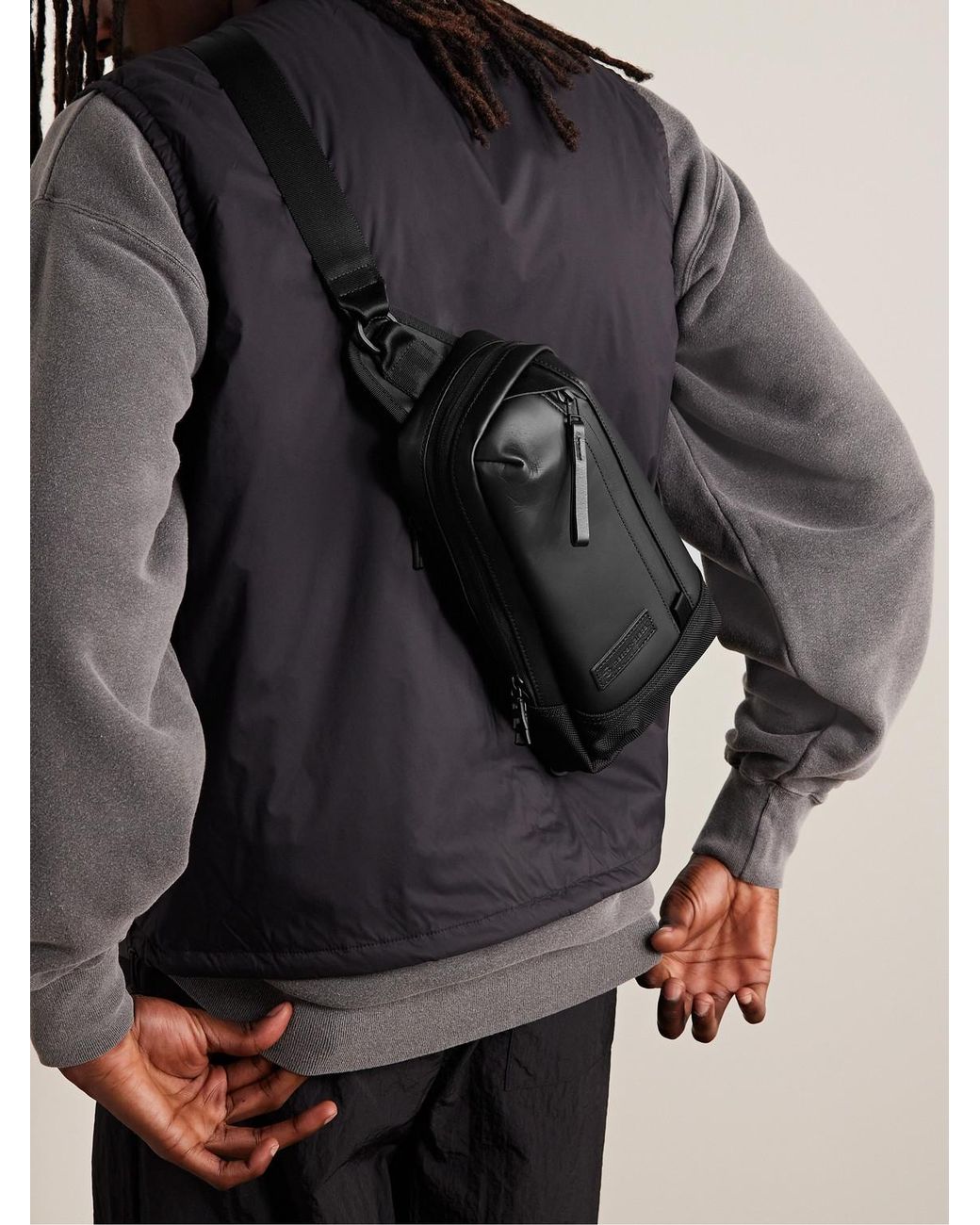 Master Piece Black Slick Logo-Appliquéd Leather And Cordura Barastec Nylon Sling Backpack for men