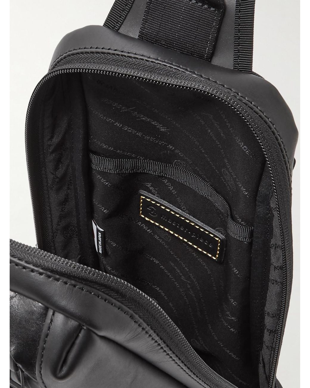 Master Piece Black Slick Logo-Appliquéd Leather And Cordura Barastec Nylon Sling Backpack for men