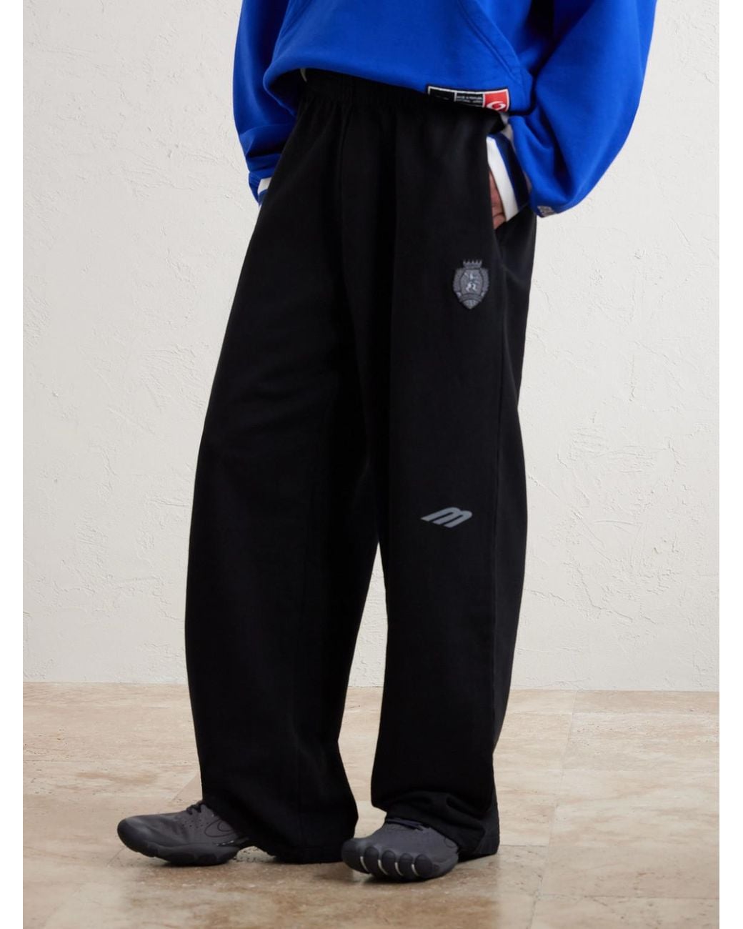 Balenciaga Black Wide-Leg Logo-Print Appliquéd Cotton-Jersey Sweatpants for men