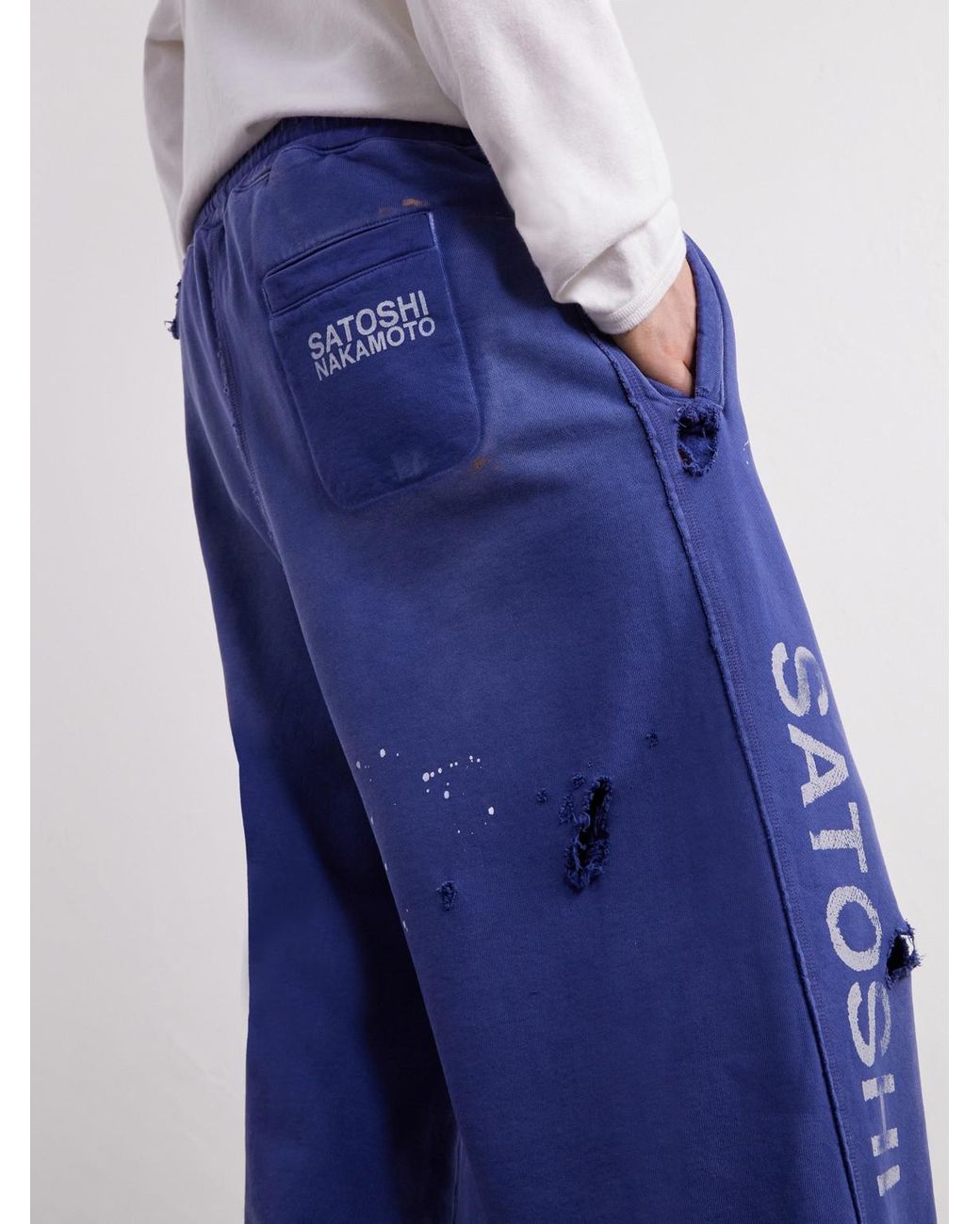 Satoshi Nakamoto Blue Luke Logo-Printed Paint-Splattered Distressed Cotton-Jersey Drawstring Sweatpants for men