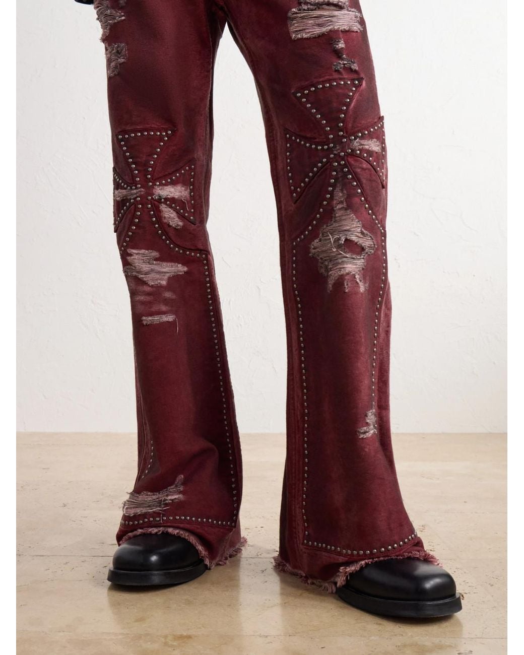SEKRIT Studded Chopper Flared Distressed Panelled Jeans for men