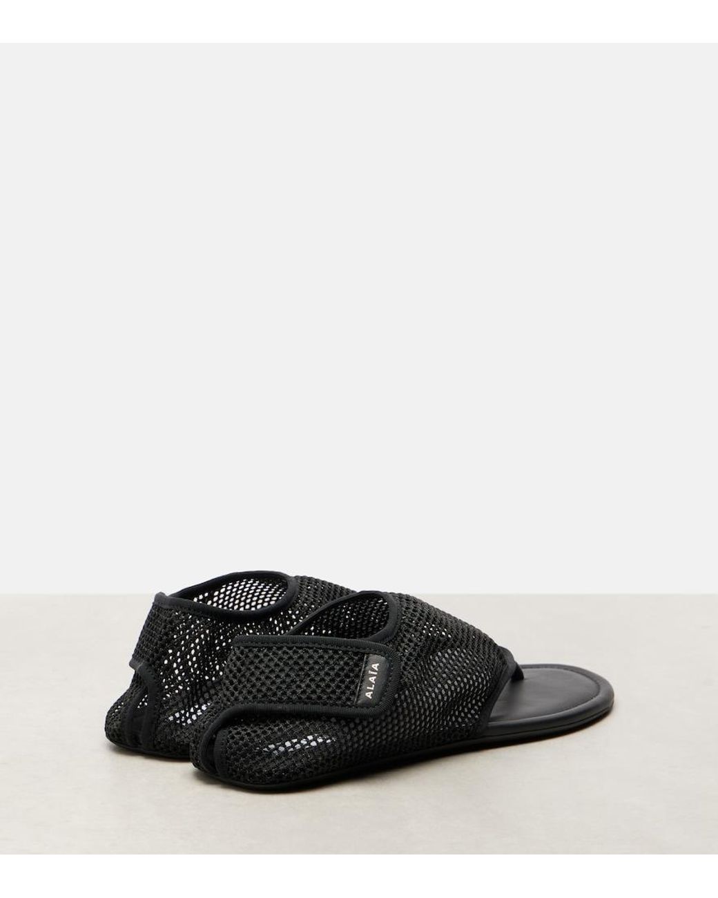 Alaïa Black Thong Fishnet Sandals