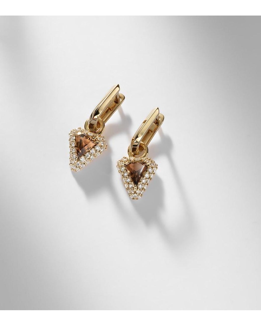 STONE AND STRAND White Power 14Kt Huggie Earrings With Diamonds And Garnet