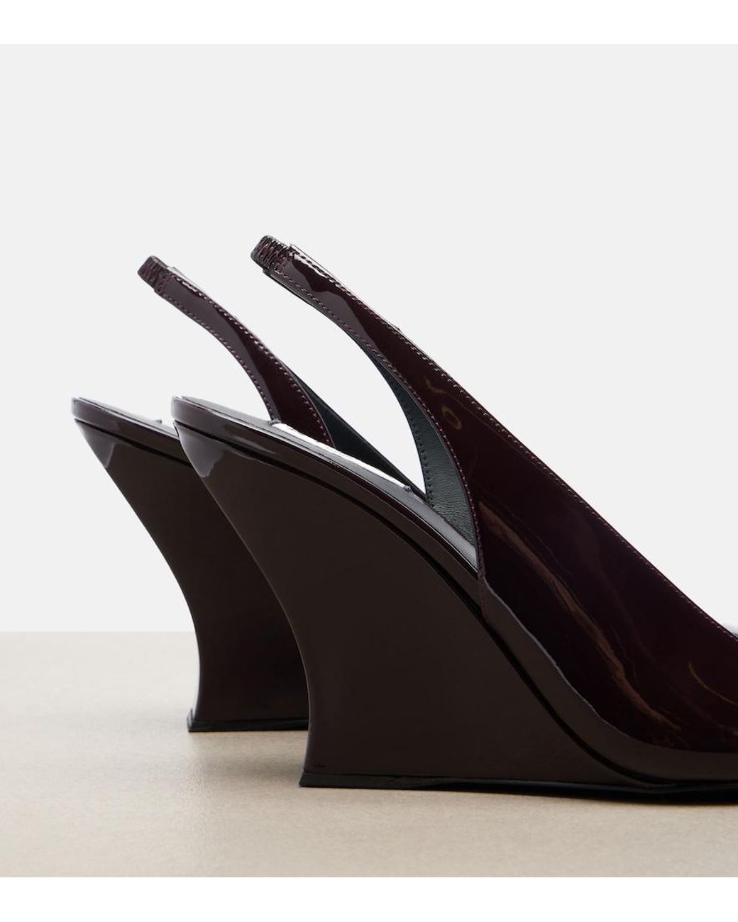 Alaïa Black Patent Leather Wedge Slingback Pumps