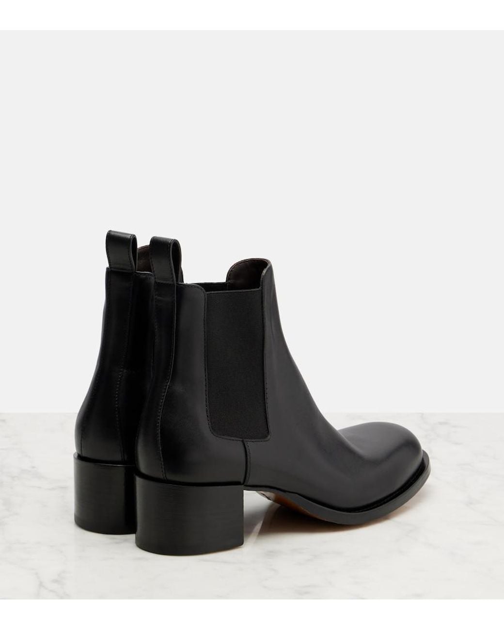 The Row Black Nobilis Chelsea Leather Ankle Boots