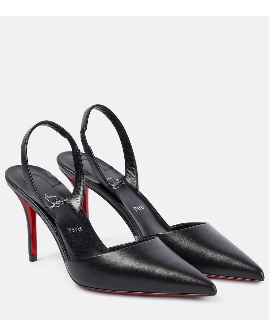 APOSTROPHA SLINGBACK PUMPS IN BLACK CALFSKIN AND CLEAR PVC JEWELED BOW