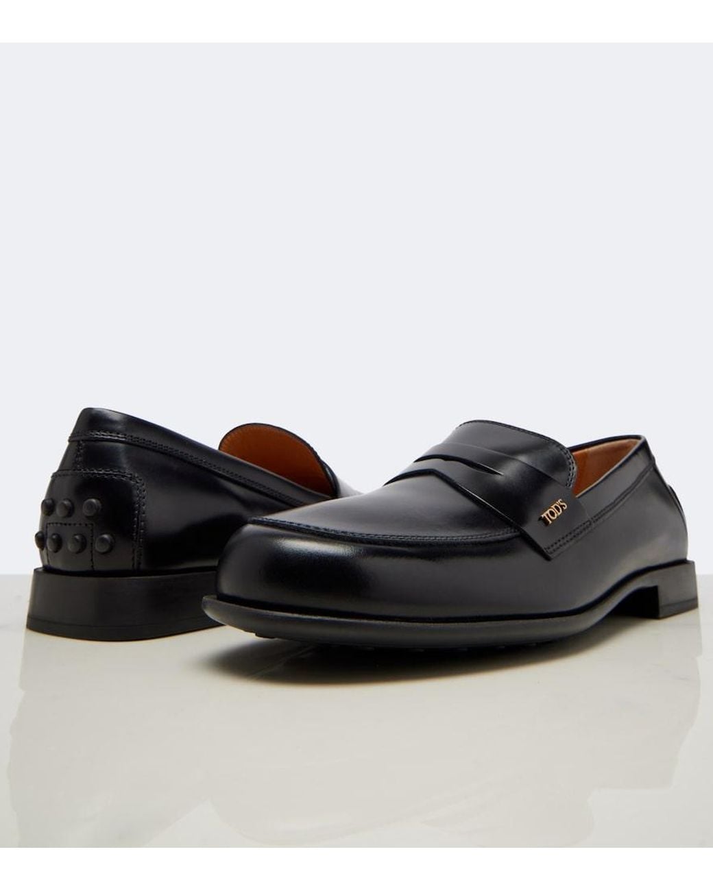 Tod's Black Leather Penny Loafers