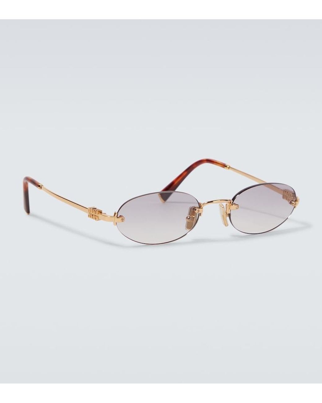 Miu Miu Metallic Oval Sunglasses for men