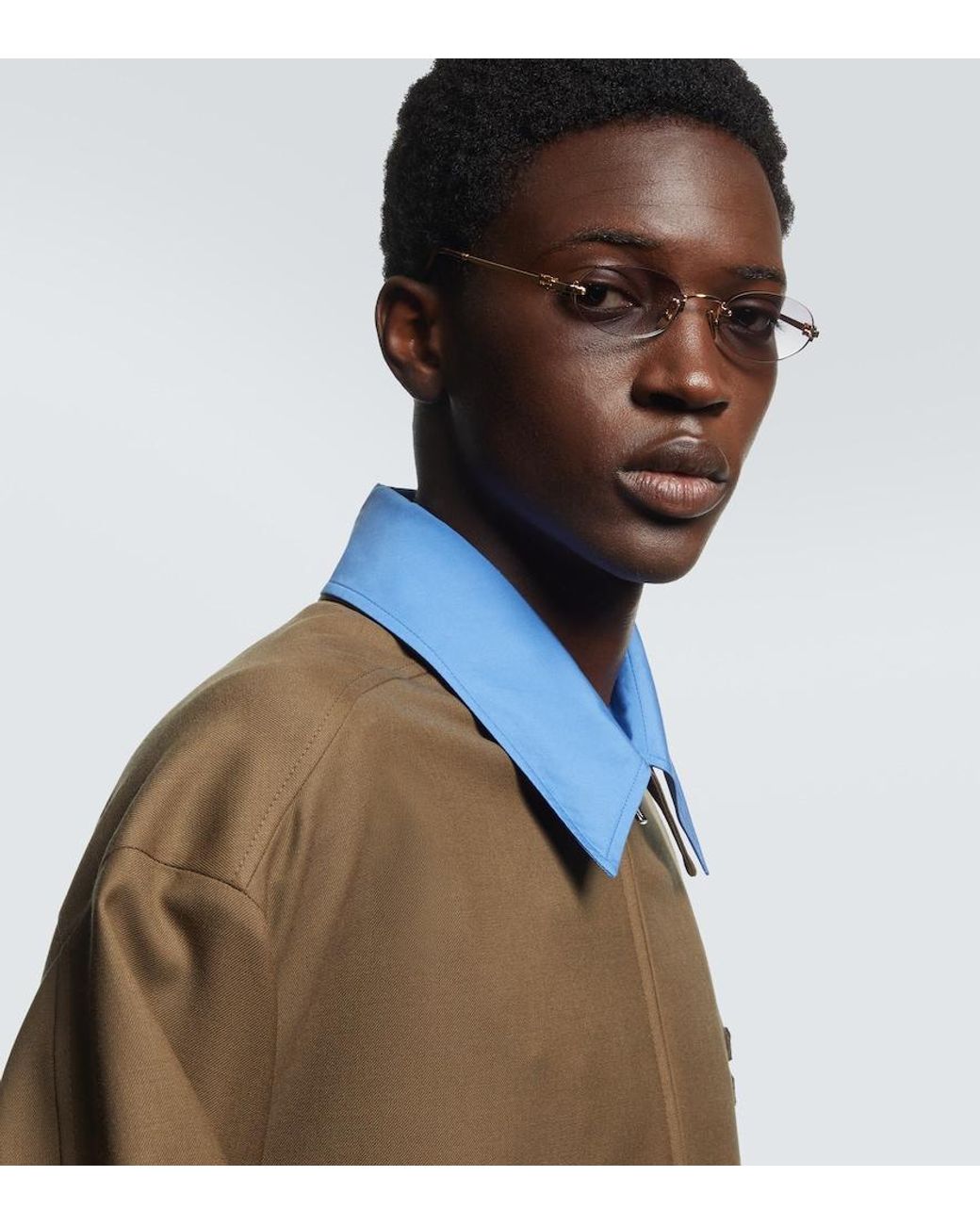 Miu Miu Metallic Oval Sunglasses for men