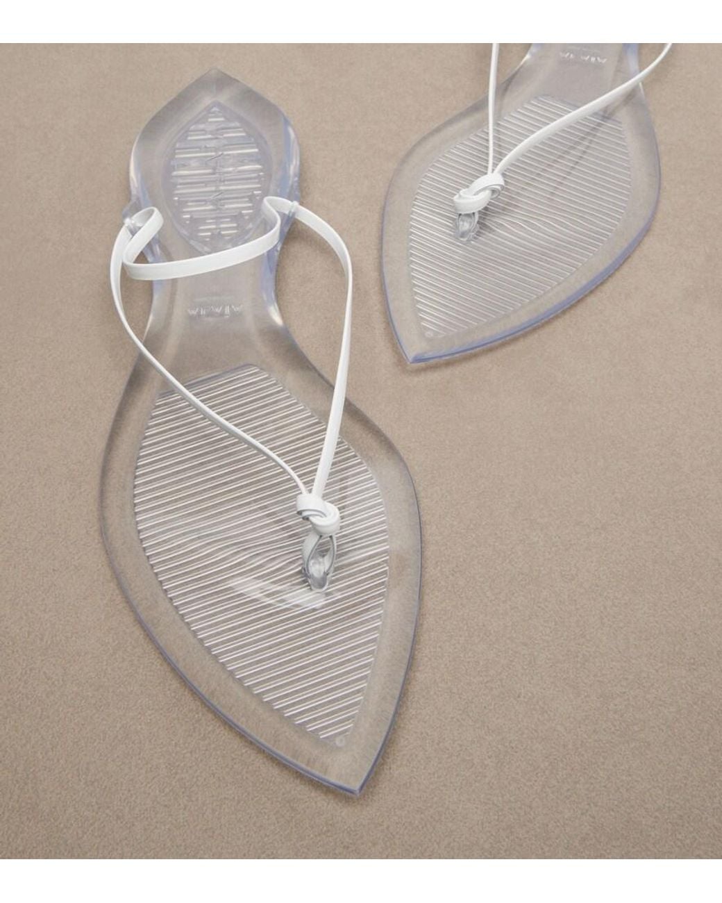 Alaïa White Invisible Leather Thong Sandals