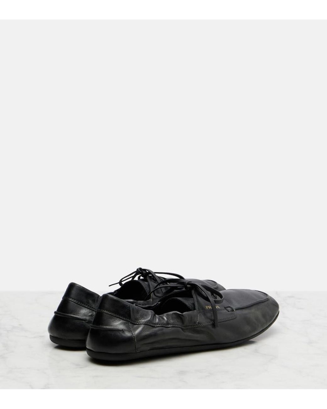 Prada Black Shuffle Leather Boat Shoes
