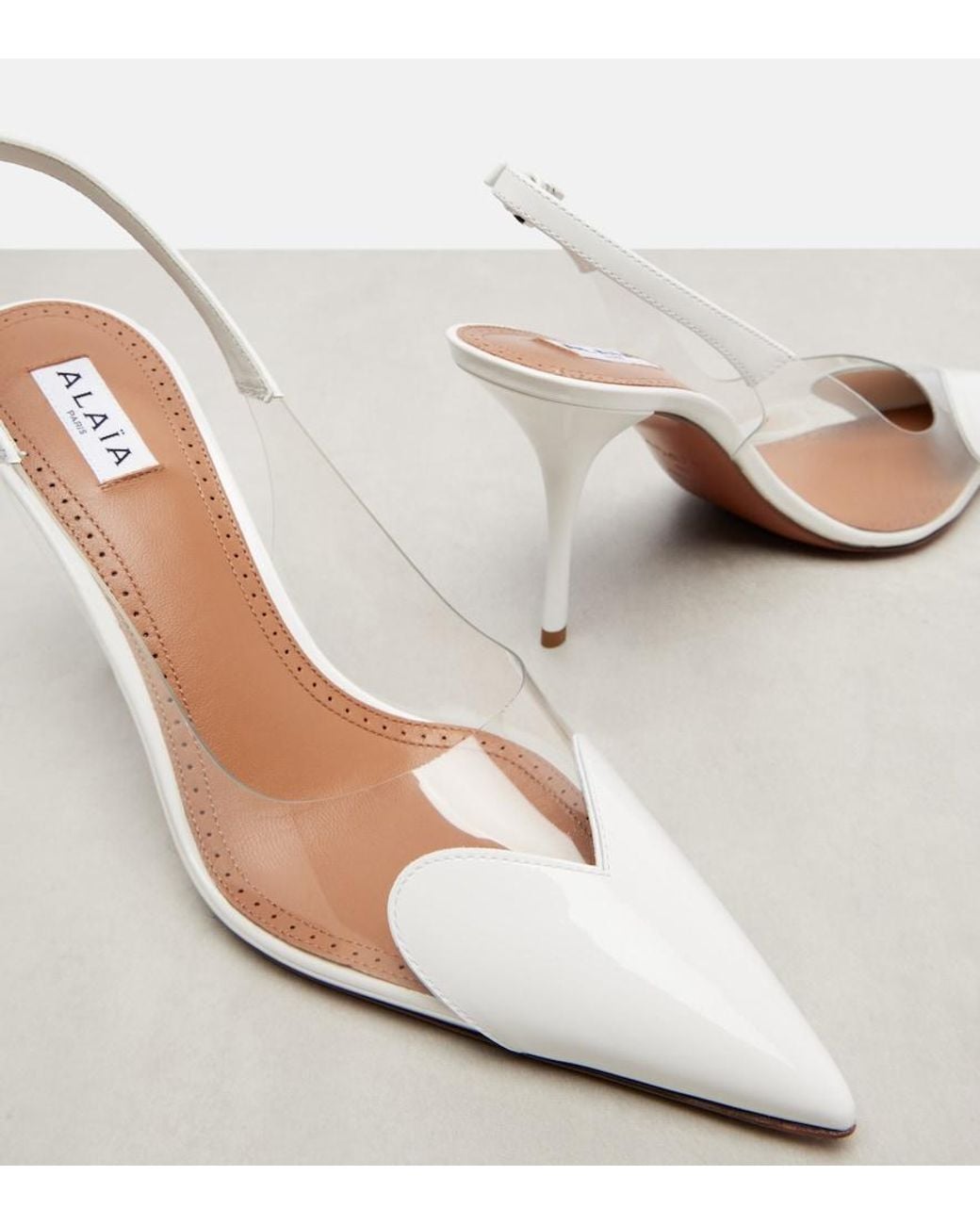 Alaïa White Le Cour 90 Patent Leather Slingback Pumps