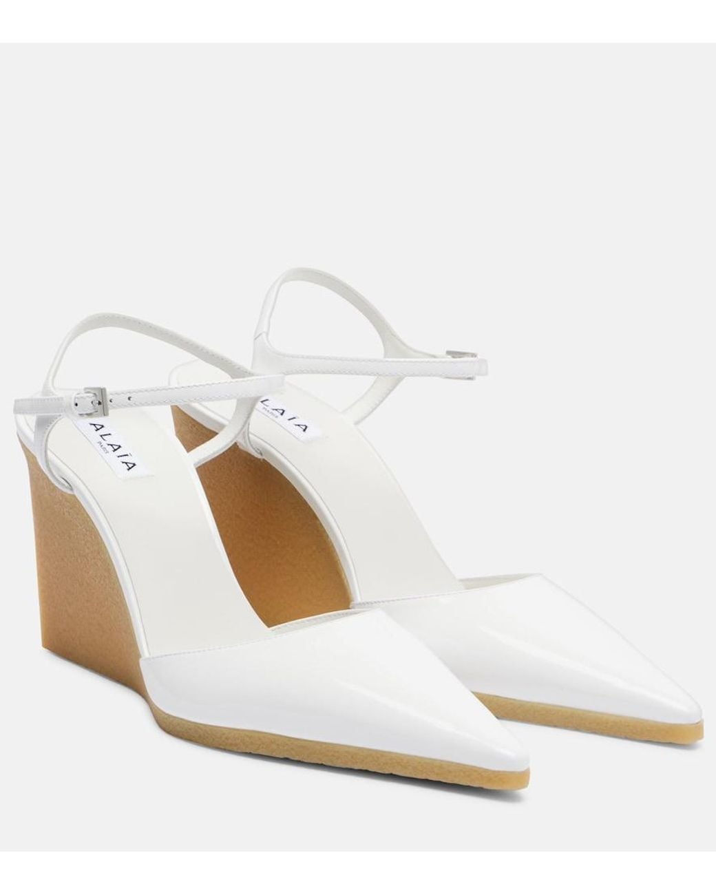Alaïa White 90 Patent Leather Wedge Slingback Pumps