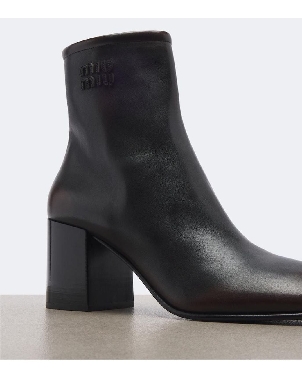 Miu Miu Black Logo Leather Ankle Boots