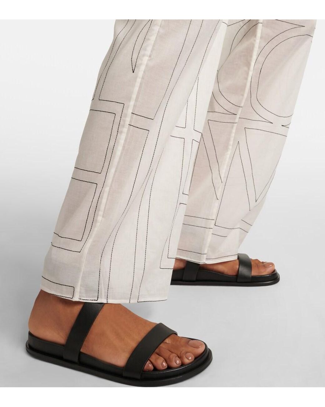 Totême  White Monogram Cotton-Blend Wide-Leg Pants