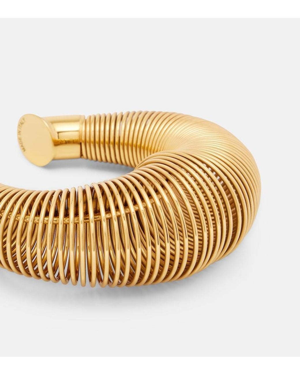 Alaïa Metallic Logo Cuff Bracelet