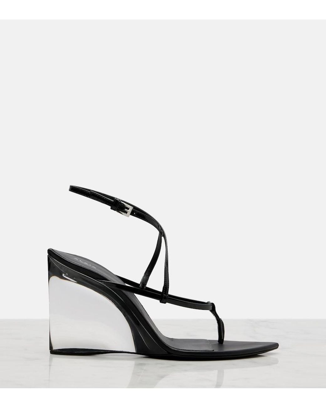 Alaïa Black Patent Leather Wedge Thong Sandals