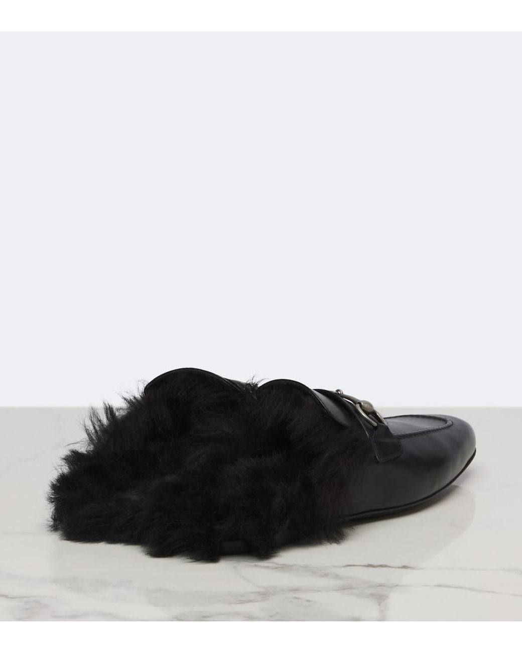 Mules Larindo De Piel Con Borrego Y Horsebit Gucci de color Black