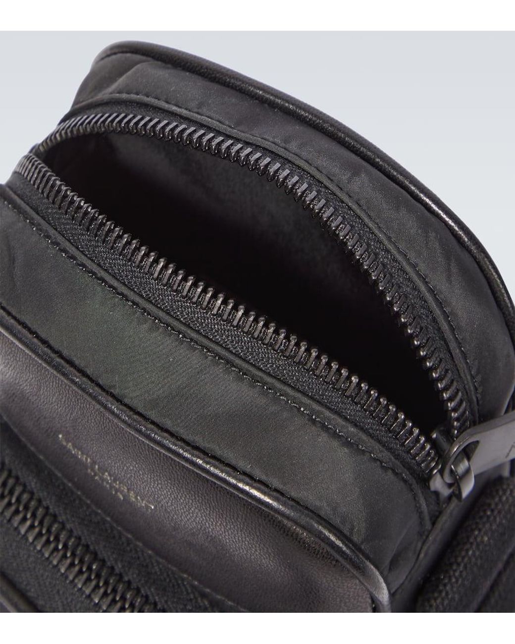 Saint Laurent City Mini Logo-Print Leather-Trimmed Shell Saint Laurent City Mini Logo-Print Leather-Trimmed Shell