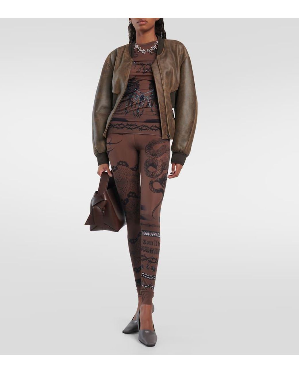 x KNWLS printed jersey flared leggings in brown - Jean Paul Gaultier