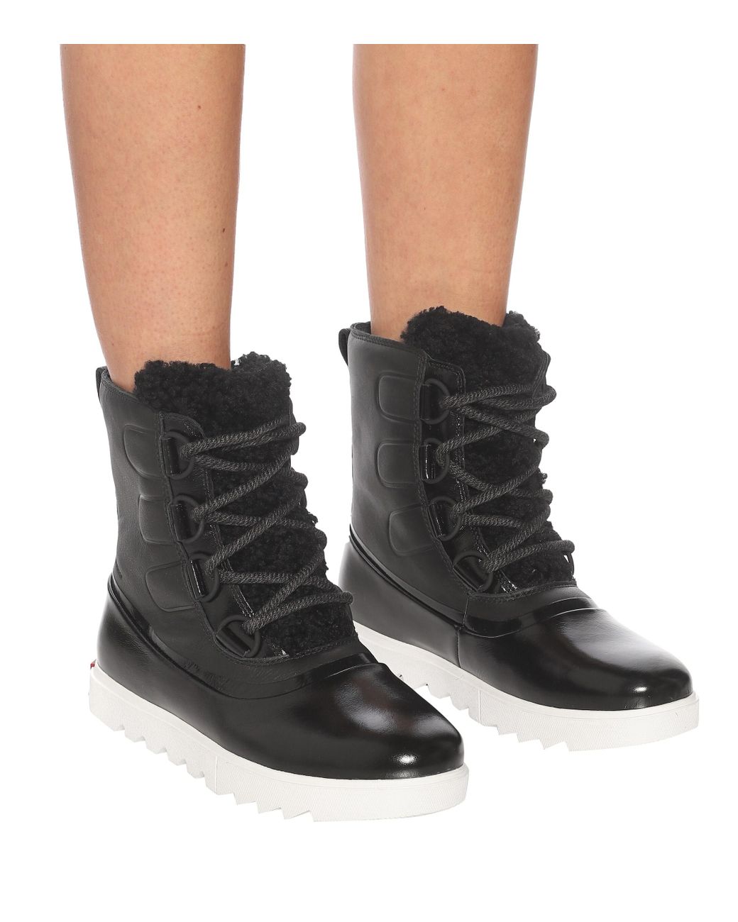 Sorel Joan Of Arctic Next Lite Leather Snow Boots in Black - Lyst